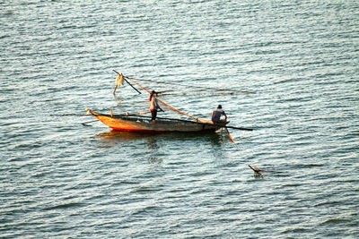 People on boat in water