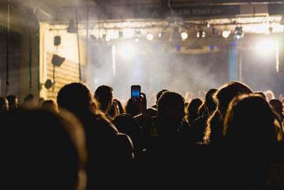 Group of people at music concert