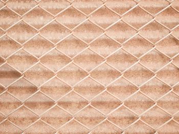 Full frame shot of chainlink fence and corrugated iron