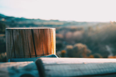 Close-up of wooden fence against sky