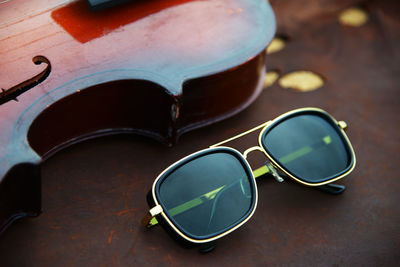 Close-up of sunglasses on table