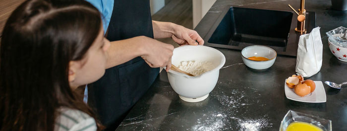 Close-up of woman preparing food