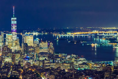 Illuminated buildings in city at night