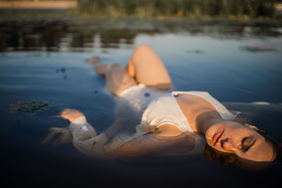 Beautiful woman in lake