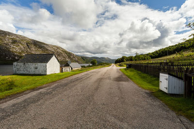 Empty road against sky