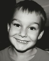 Close-up portrait of smiling boy
