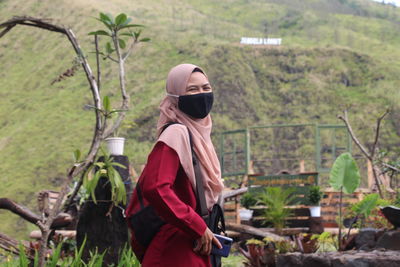 Full length of woman standing on land