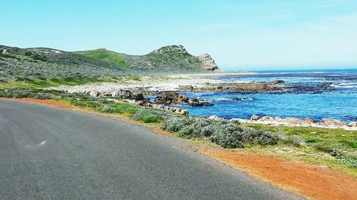 Scenic view of sea against clear blue sky