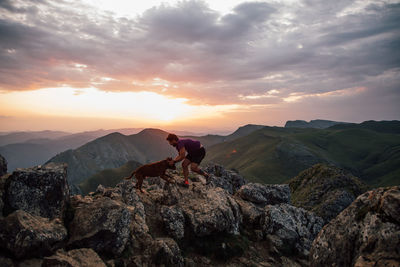 Scenic view of mountains against sky during sunset