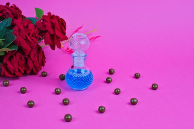 Close-up of pink flowers on table