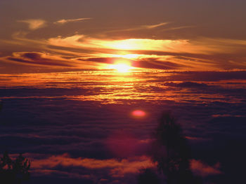 Low angle view of dramatic sky during sunset