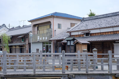 Exterior of old building in town against sky