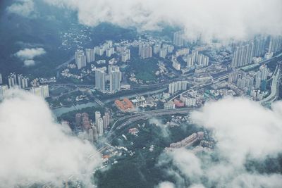 High angle view of bridge over buildings in city