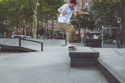 Full length of man skateboarding on skateboard