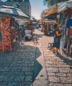 People at street market in city