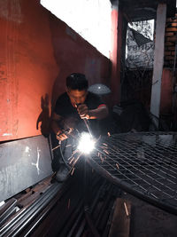 Welder working at factory