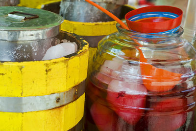 Close-up of multi colored jar on table