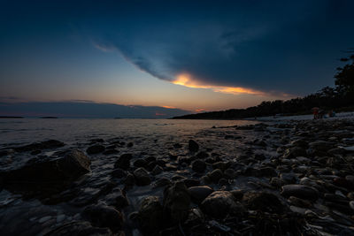 Scenic view of sea against sky during sunset