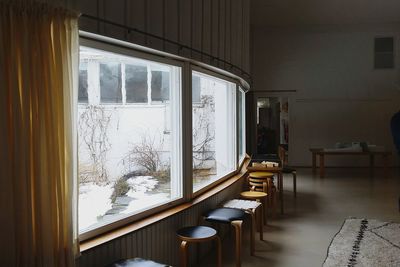 Empty glass window of house in winter