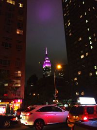 Low angle view of city street at night