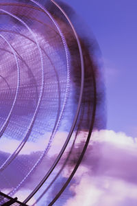 Low angle view of metallic structure against sky