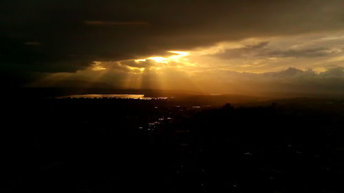 Scenic view of sunset over mountains