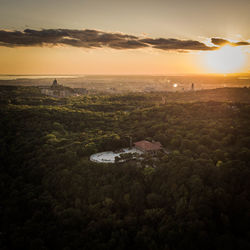 High angle view of buildings against sky during sunset