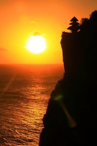 Scenic view of sea at sunset