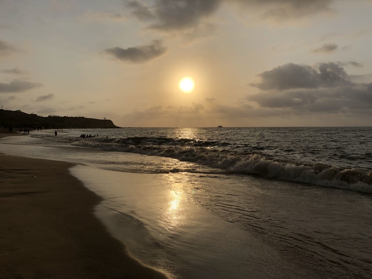 sea, sunset, beach, sun, water, nature, sky, scenics, beauty in nature, sand, tranquility, tranquil scene, reflection, idyllic, cloud - sky, sunlight, horizon over water, outdoors, travel destinations, no people, wave, day