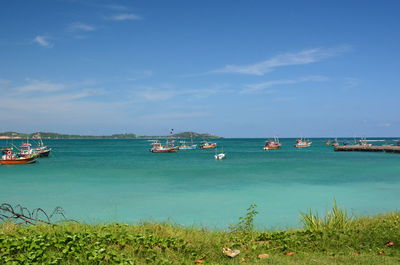 Scenic view of bay against sky