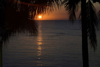 Scenic view of sea at sunset