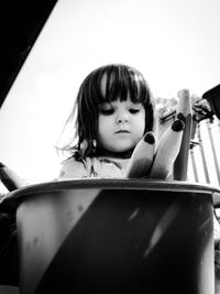 Portrait of cute girl in car