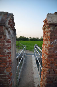 View of brick wall against clear sky