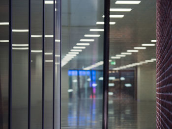 Interior of illuminated building at subway station