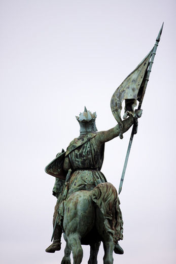 statue, sculpture, human representation, art and craft, low angle view, art, clear sky, creativity, copy space, animal representation, bird, no people, angel, outdoors, sky, day, statue of liberty, carving - craft product