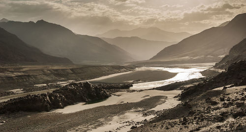 Scenic view of mountains against sky during winter