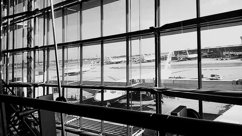 Reflection of building on glass window