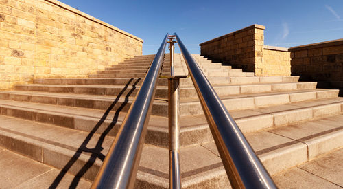 Low angle view of staircase against sky