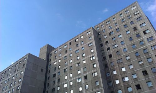 Low angle view of modern building against sky