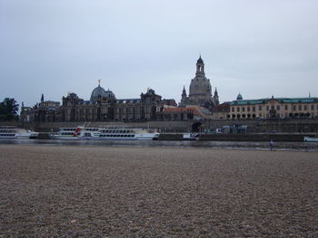 View of buildings against sky in city