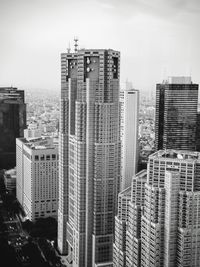 Modern buildings in city against sky