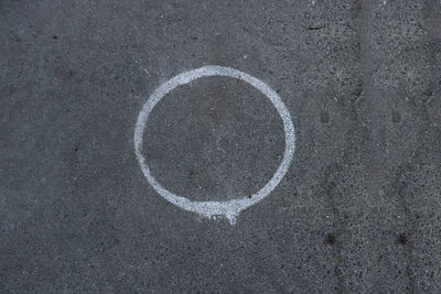 High angle view of sign on road