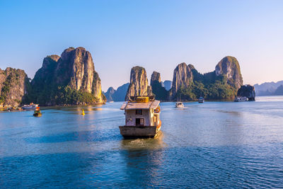Scenic view of bay against clear sky