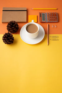 High angle view of coffee cup on table