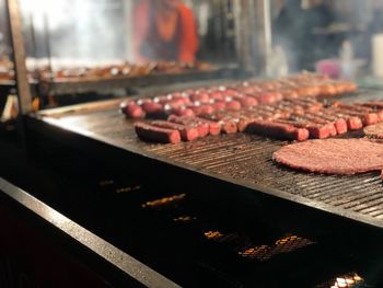 Close-up of meat on barbecue grill