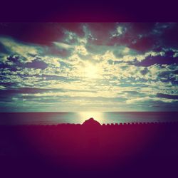 Scenic view of sea at sunset