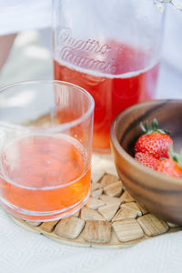 Glass of lemonade and strawberries