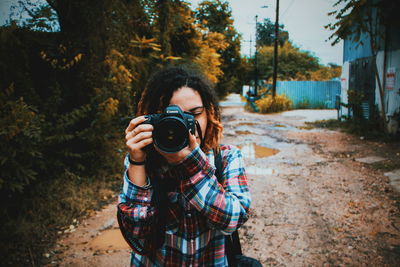 Portrait of man photographing