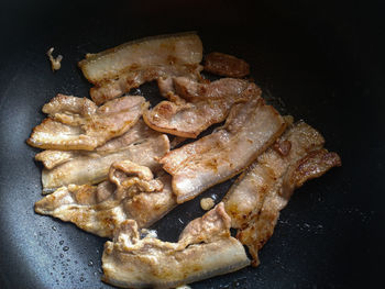 High angle view of meat in cooking pan