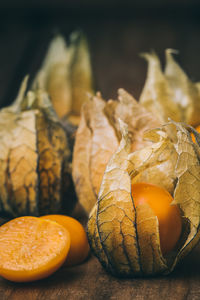 Close-up of fresh orange fruits on table